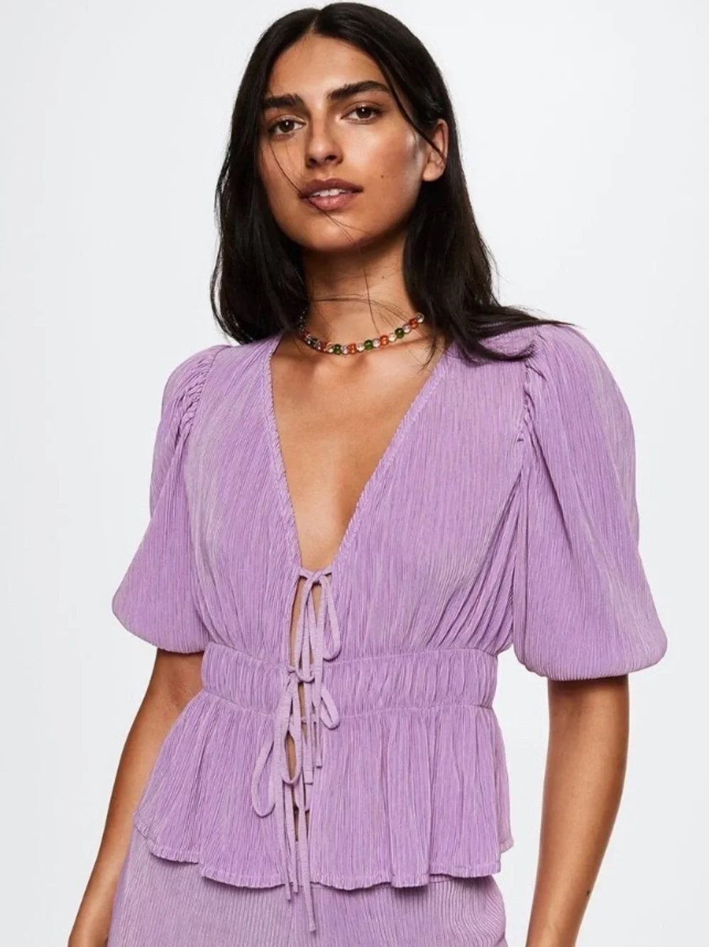 Mango plissé tie-up top w/ short puff sleeves and an elastic waist. - Picture 1 of 9